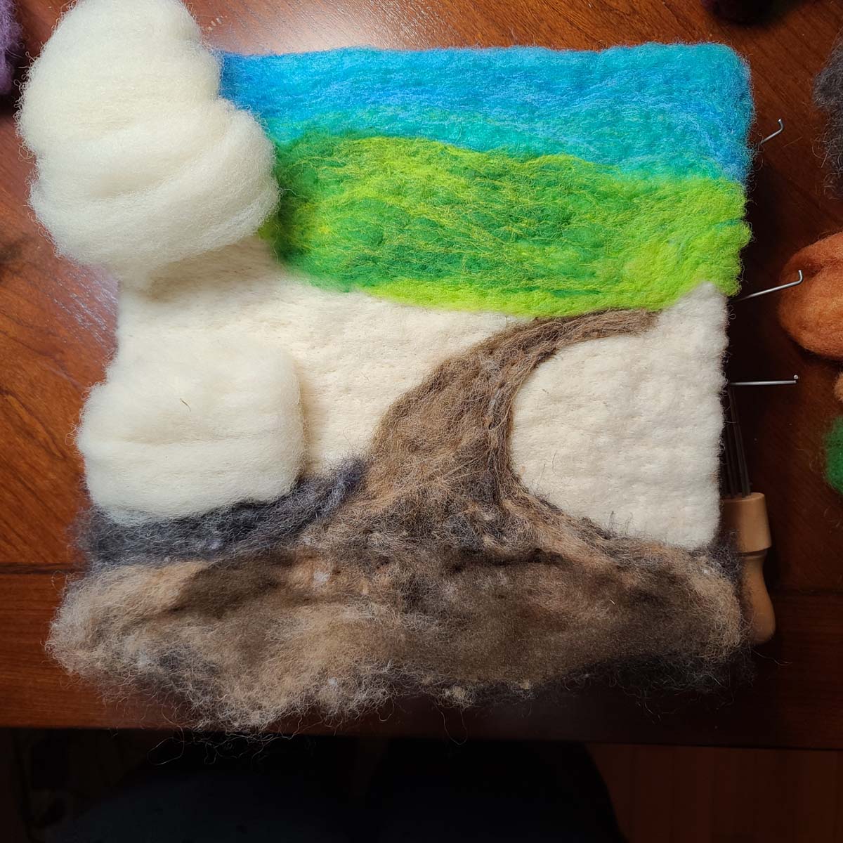 Felting a road and mountain background