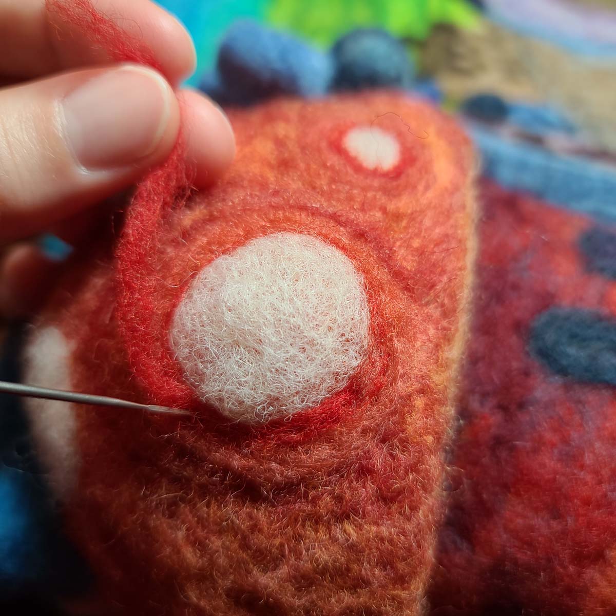 Felting accent lines on the mushroom cap dots