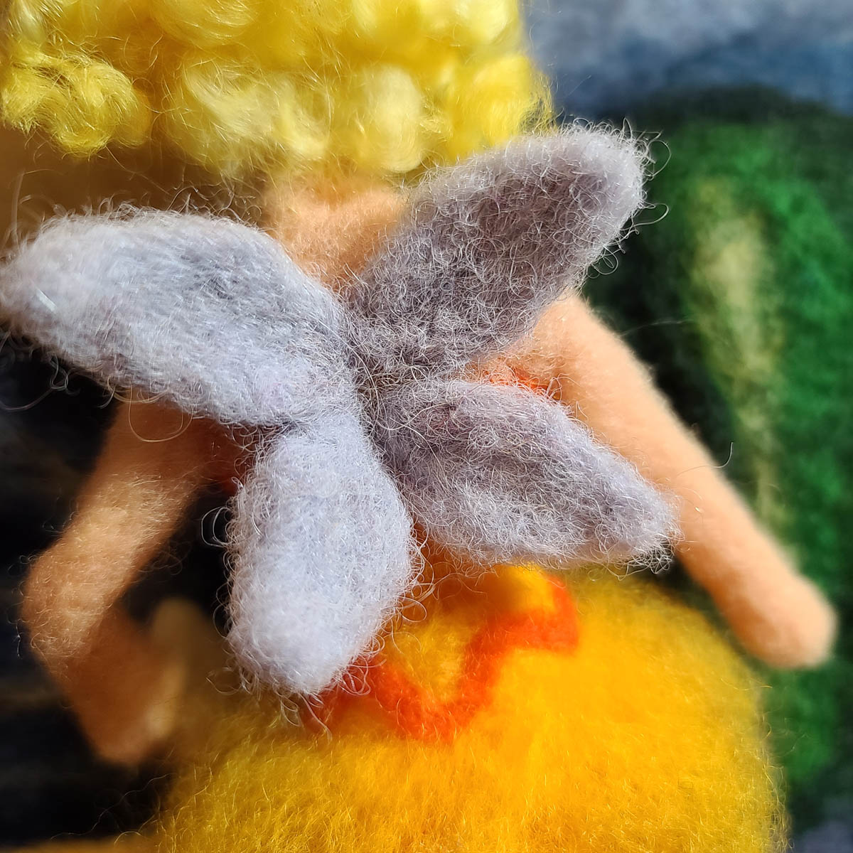 Needle Felting a Sun Fairy doll, attaching the wings