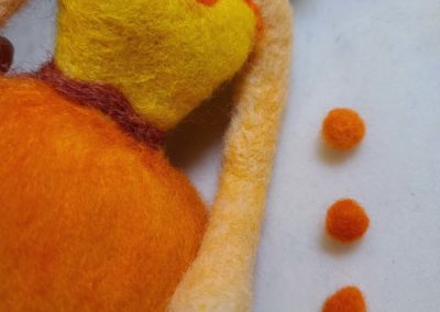 Roll and needle felt each section into a tight little wool ball.