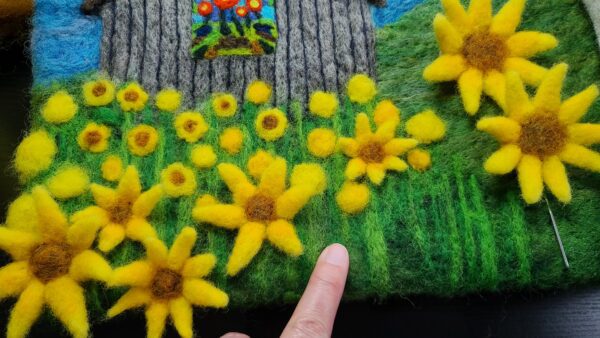 Needle felting lesson: sunflower field, master tip, adjusting your process to leave a spot for your hand to rest